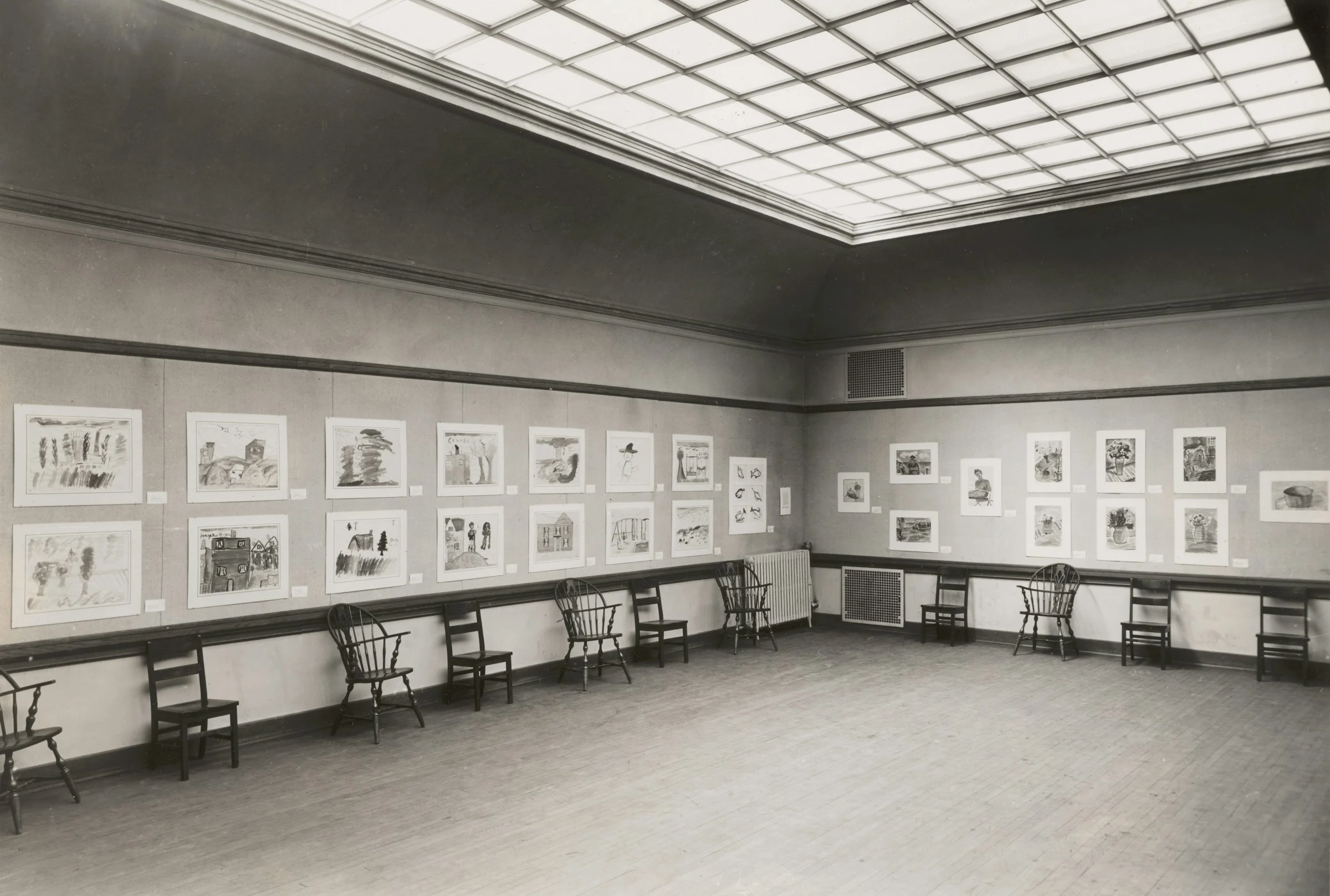 Historic art exhibition with framed paintings