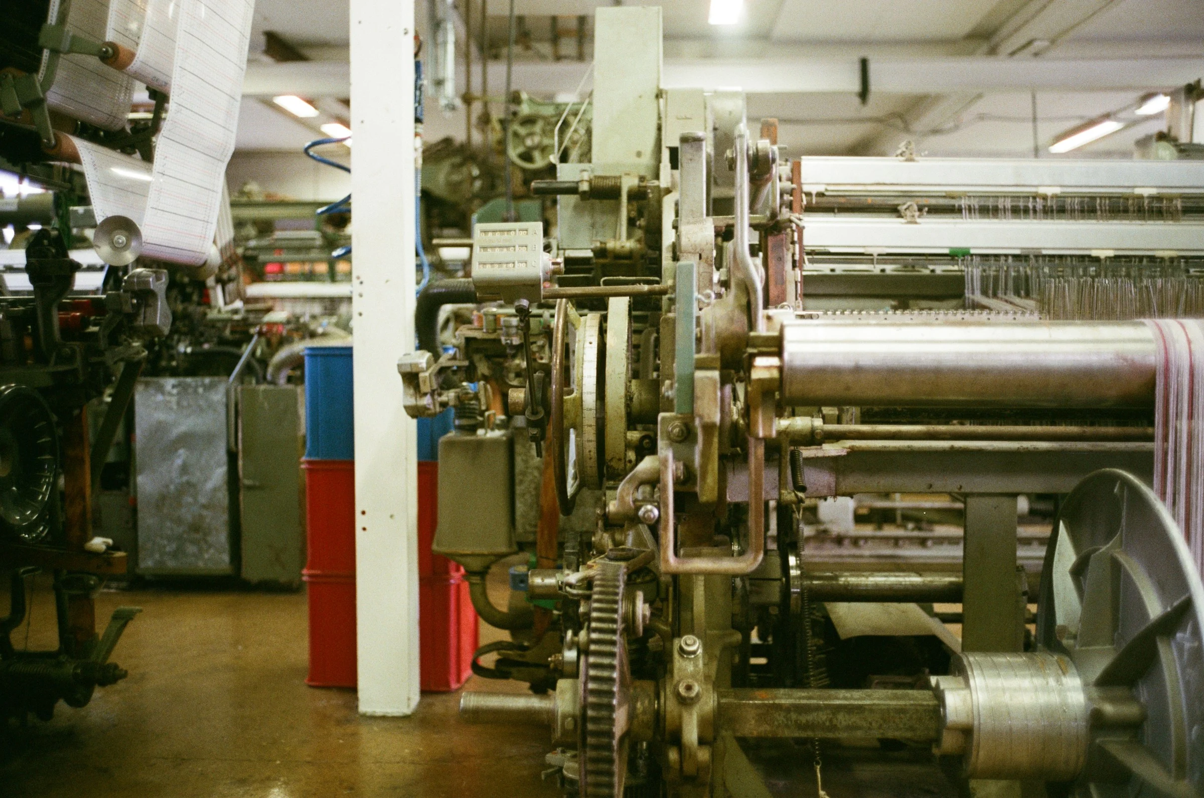 Working machinery of an industrial loom