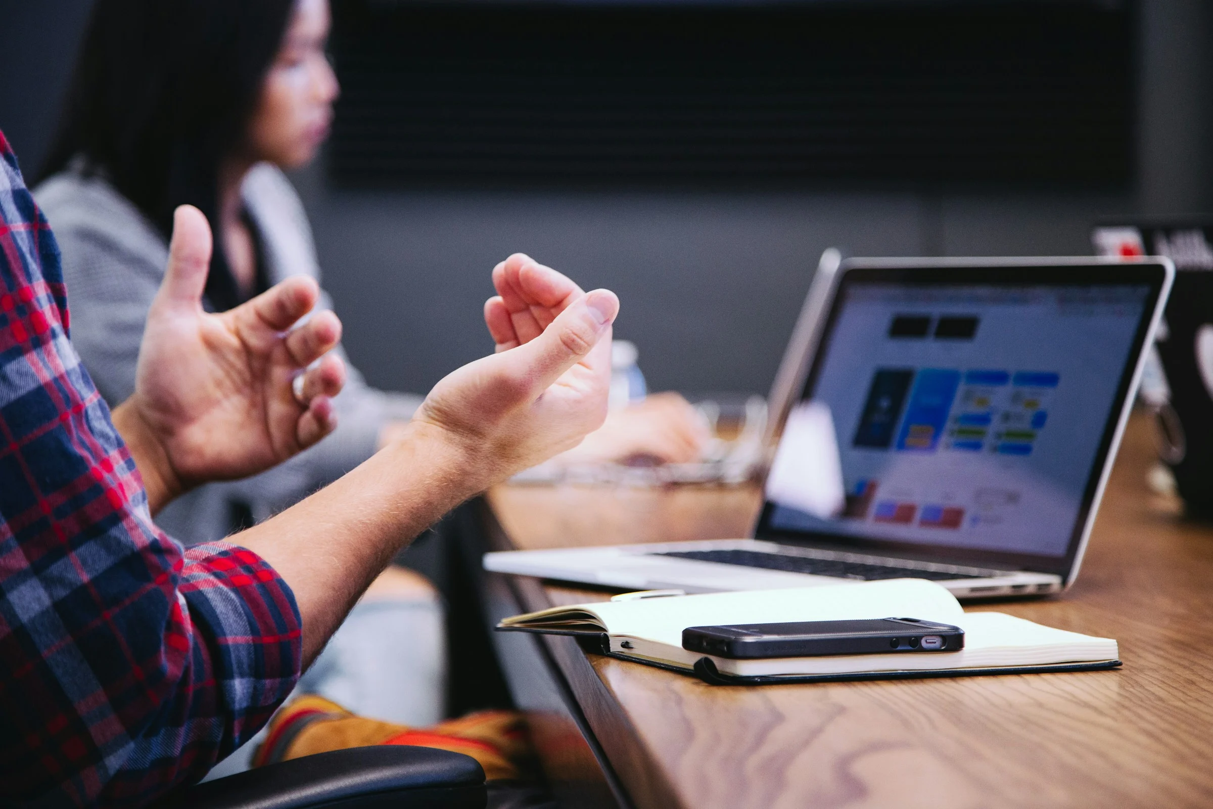 Colleagues sharing ideas in a creative studio