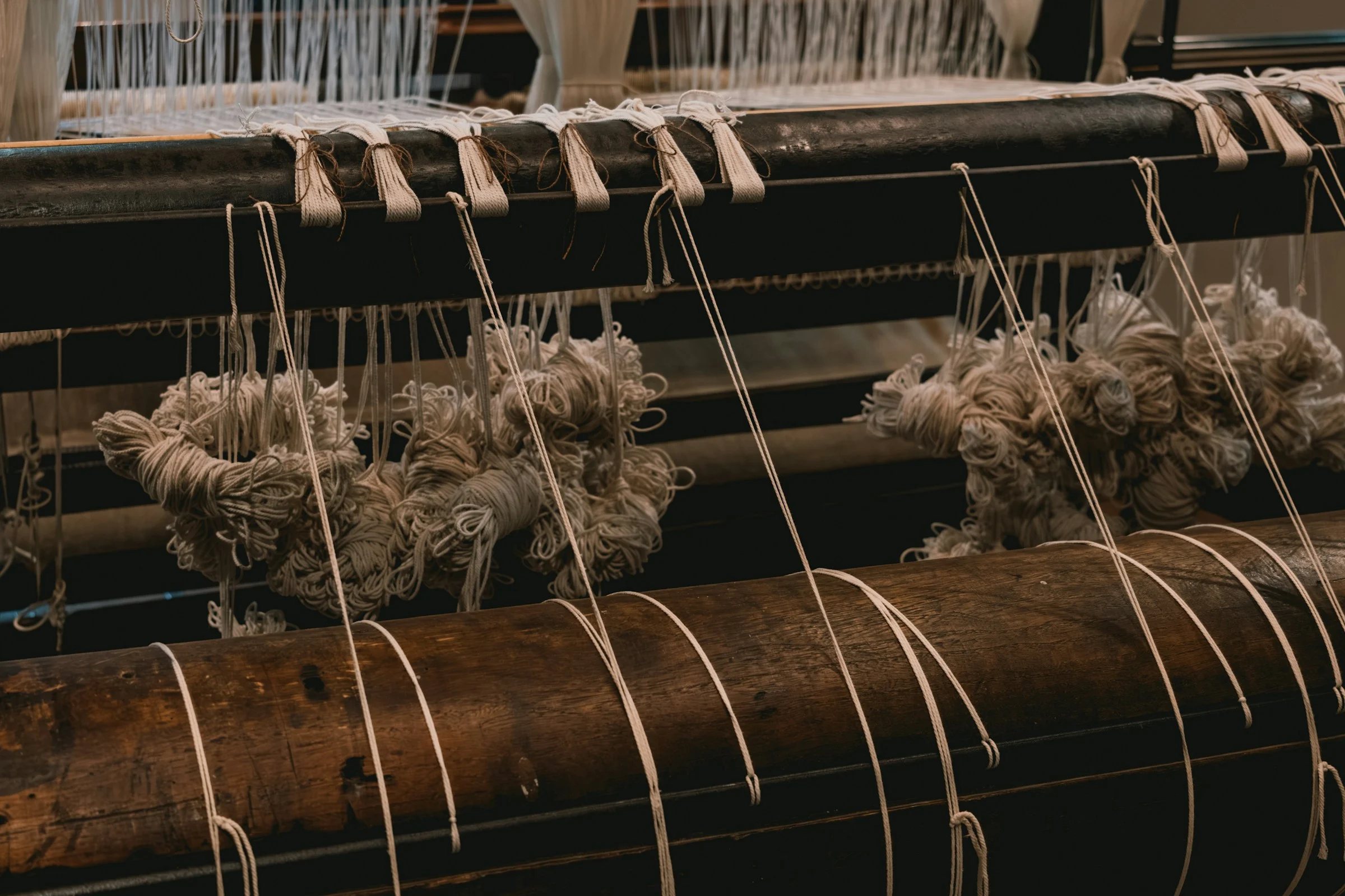 Wool threads on a wooden loom